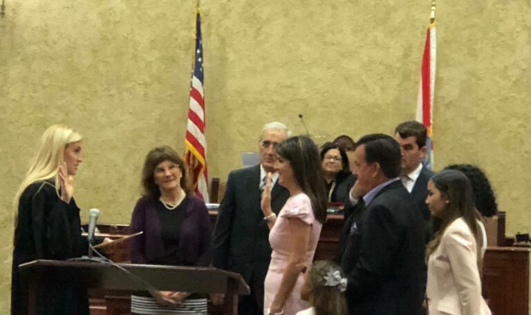 Hon Christina DiRaimondo administers the oath of office.